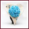 Bouquet de mariée coeur ivoire et roses turquoise