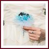 Bouquet demoiselle d'honneur organza turquoise et roses chocolat