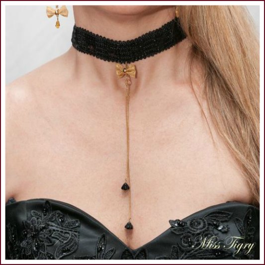 Collier ras de cou noir paillettes et nœud doré