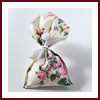 Pochons ballotins dragées fleuris rose pastel